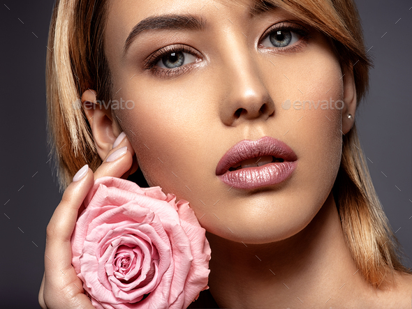 Beautiful young fashion woman with light pink lipstick. Beauty m - Stock Photo - Images