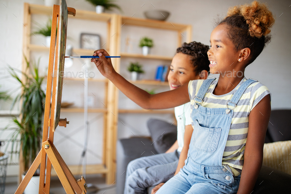 Concept of early childhood education, painting, talent, happy kids