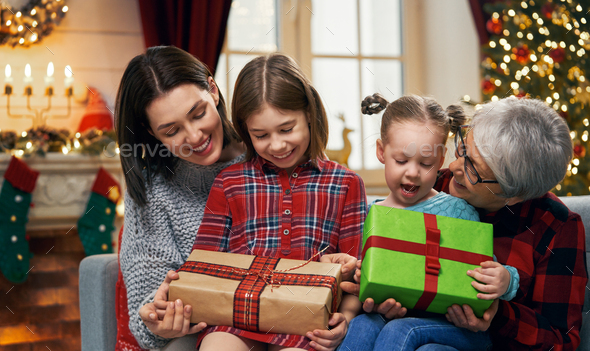 family celebrating Christmas - Stock Photo - Images
