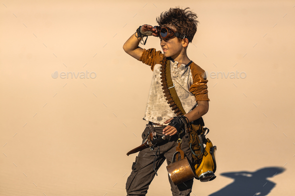 Post Apocalyptic Boy Outdoors in Desert - Stock Photo - Images