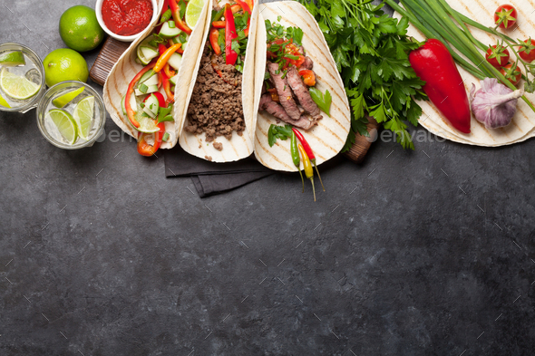 Mexican tacos and caipirinha cocktail - Stock Photo - Images