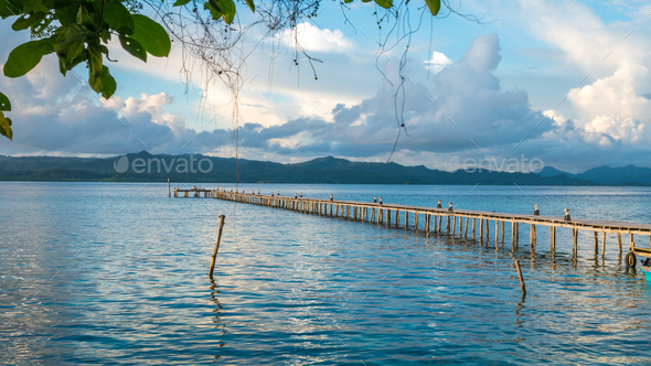 Pier of Dive Station - Kri Island. Clound above Gam in Background. Raja Ampat, Indonesia, West Papua