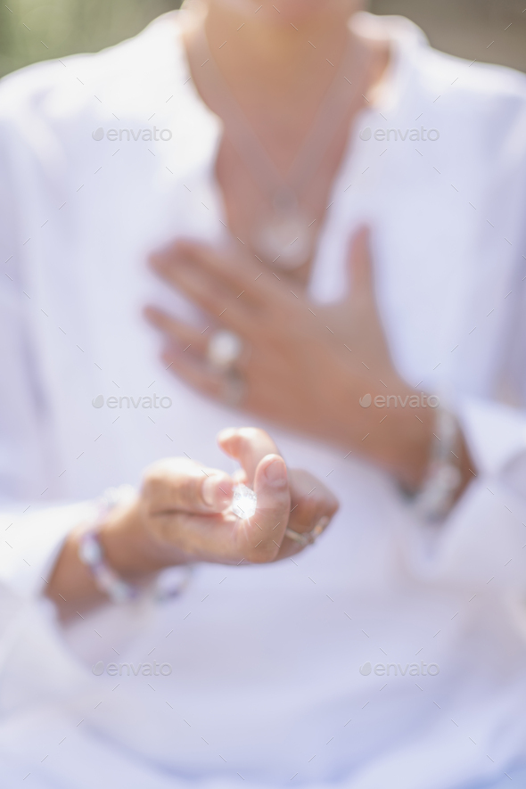 Increasing Positive Energy with Crystal, Practicing Mindfulness - Stock Photo - Images