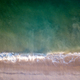 Drone picture of waves hitting the beach. - PhotoDune Item for Sale