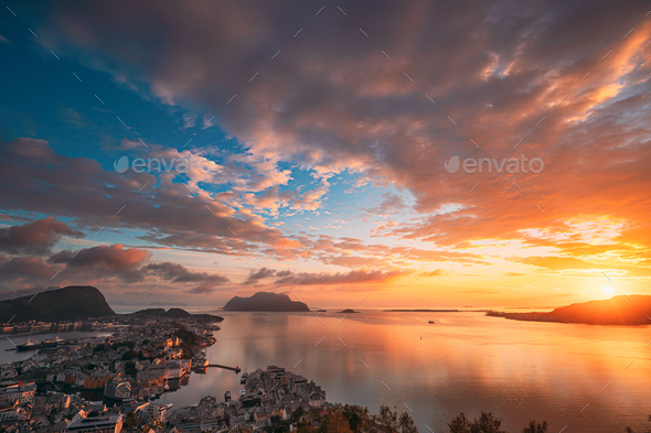 Alesund, Norway. Amazing Natural Bright Sunset Dramatic Sky In W - Stock Photo - Images