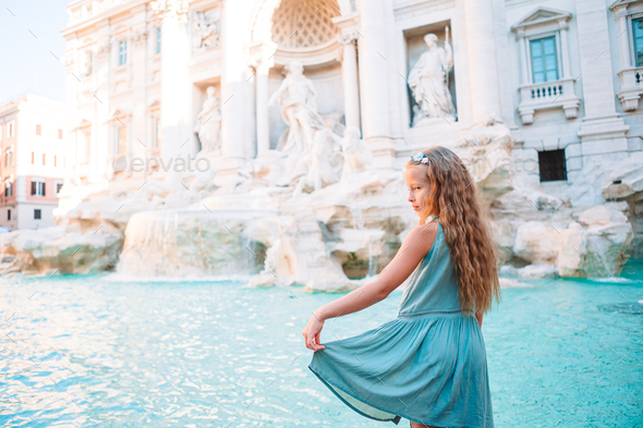 Adorable little girl background Trevi Fountain, Rome, Italy - Stock Photo - Images