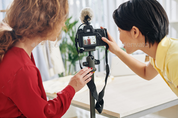 Bloggers making fashion haul video - Stock Photo - Images