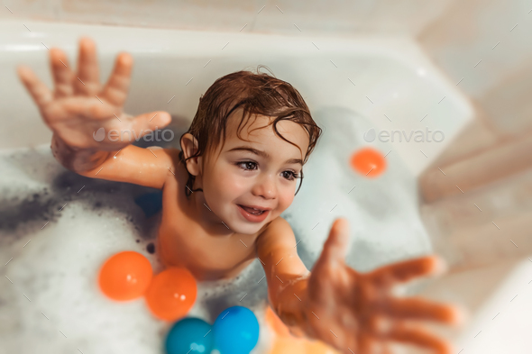 little boys taking a bath