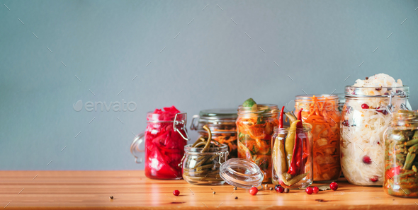 Assortment of various fermented and marinated food over wooden background, copy space. Fermented - Stock Photo - Images