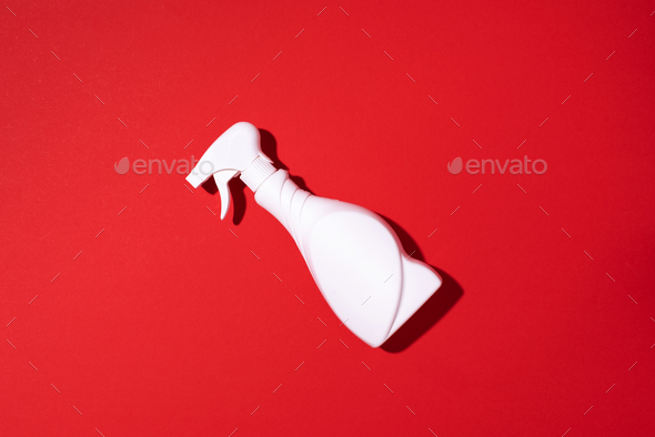 White plastic bottle of cleaning product, household chemicals or liquid laundry detergent on red - Stock Photo - Images