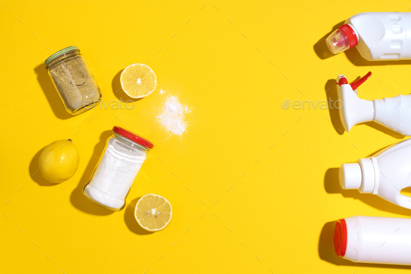Flat lay composition with eco-friendly natural cleaners. Baking soda, salt, lemon and mustard powder