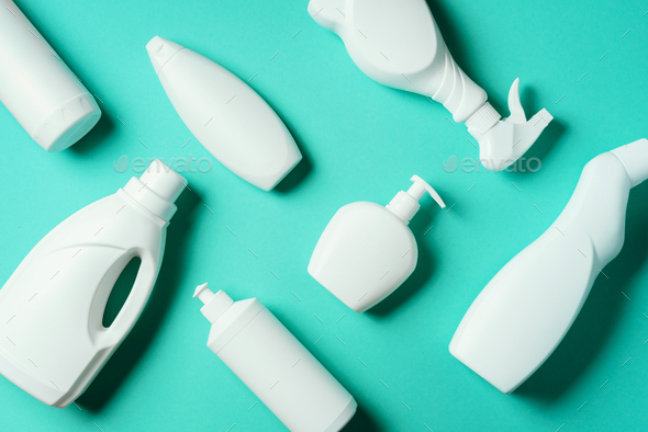 Cleaning products on blue background. Top view. Copy space. Chemical cleaning supplies. Stop plastic - Stock Photo - Images