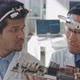 Male Engineers Examining Motherboard in Laboratory - VideoHive Item for Sale