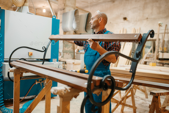 Carpenter, wooden bench manufacturing, joiner job - Stock Photo - Images