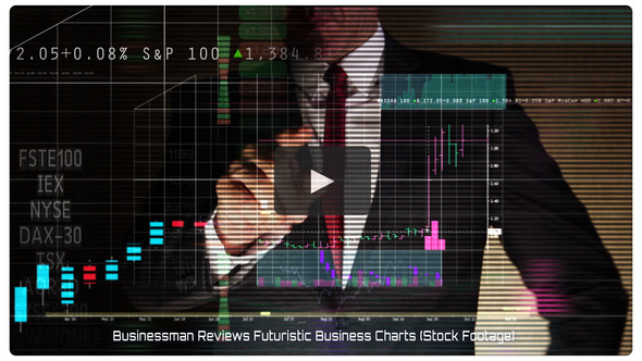 Businessman Reviews Futuristic Business Charts