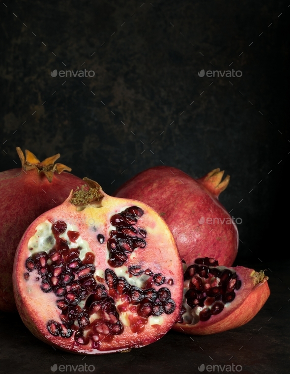 Pomegranate Fruits on a Dark Background