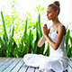 Woman Practicing Yoga And Meditating - VideoHive Item for Sale