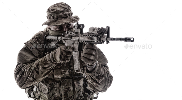 Army infantryman aiming service rifle studio shoot - Stock Photo - Images