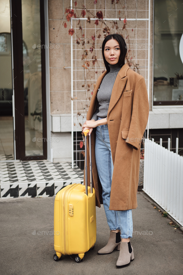 away yellow suitcase