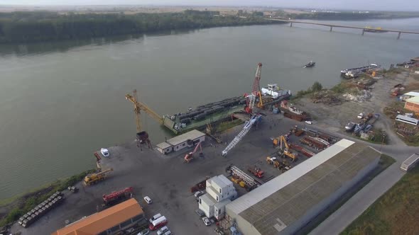 Aerial Crane Transporting Cargo  alt