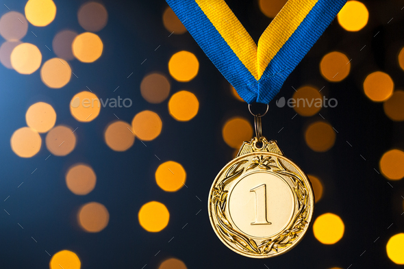 Gold champion or winners medallion on a ribbon - Stock Photo - Images