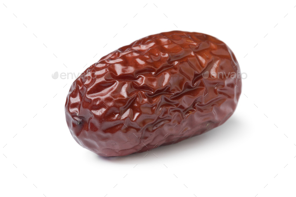 Single dried Chinese red date close up