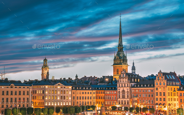 Stockholm, Sweden. Scenic View Of Skyline At Evening Night. Tower Of Storkyrkan - The Great Church - Stock Photo - Images