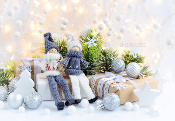 Christmas composition with toys dolls and spruce branches - Stock Photo - Images