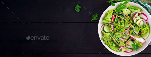 Vegetarian vegetable salad of radish, cucumbers, lettuce - Stock Photo - Images