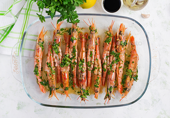 Grilled wild Argentinian red shrimps/prawns with parsley - Stock Photo - Images