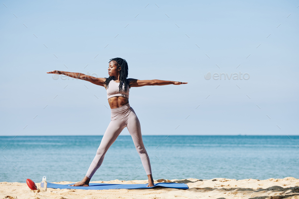 Young woman in warrior pose