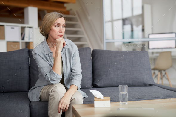 Pensive Mature Woman at Home - Stock Photo - Images