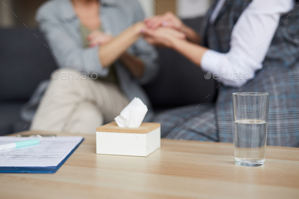 Caring Psychologist Holding Hands of Female Patient - Stock Photo - Images