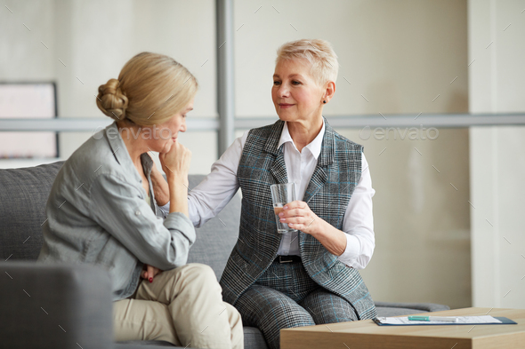 Female Psychologist Consulting Mature Woman - Stock Photo - Images