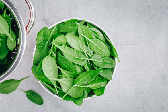 Fresh Spinach Leaves. Raw Spinach in a bowl for vegetarian or vegan salad or smoothie. - Stock Photo - Images