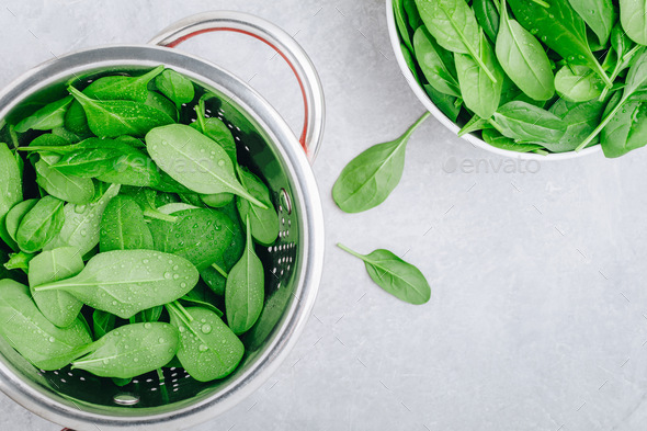 Fresh Spinach Leaves. Raw Spinach in a bowl for vegetarian or vegan salad or smoothie. - Stock Photo - Images