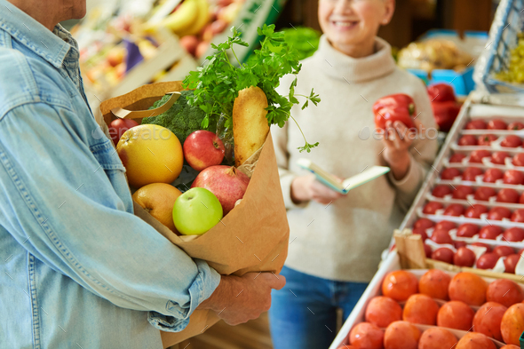 Senior Couple Grocery Shopping at Market - Stock Photo - Images