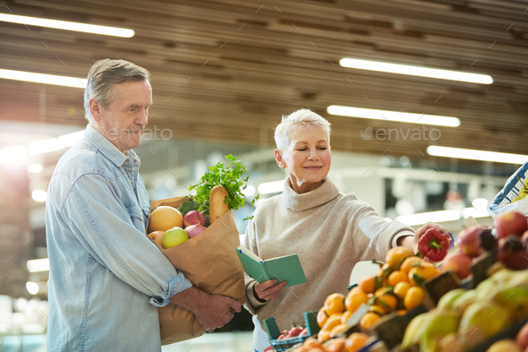Senior Couple Grocery Shopping at Farmers Market - Stock Photo - Images