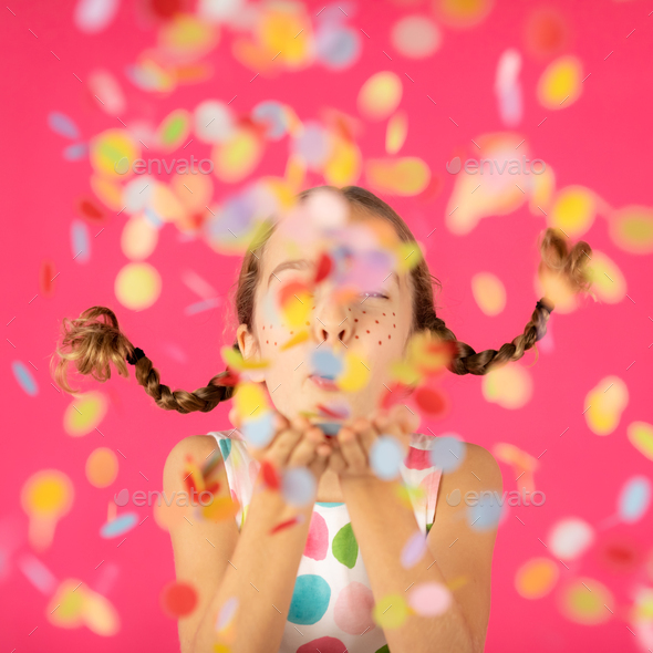 Portrait of fancy girl against pink background - Stock Photo - Images