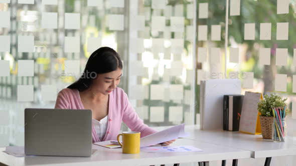 Young Business Women Are Planning Work For Next Year On Office