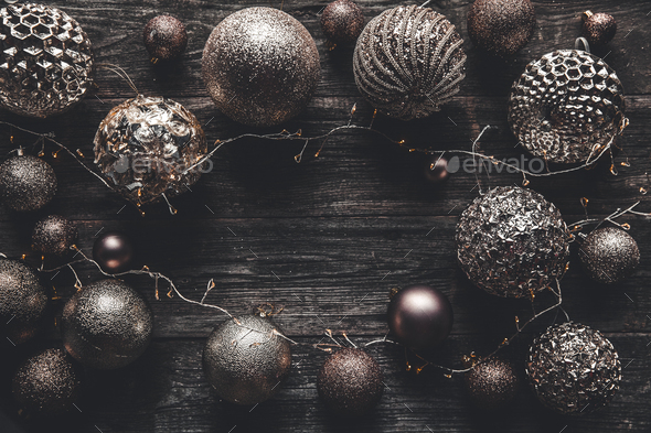 Christmas or New Year background. Vintage Christmas tree toy decoration balls and light garland - Stock Photo - Images