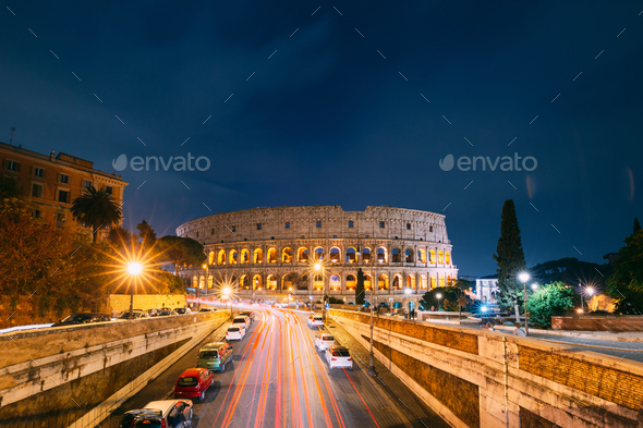 Rome, Italy. Colosseum Also Known As Flavian Amphitheatre In Evening Or Night Time - Stock Photo - Images