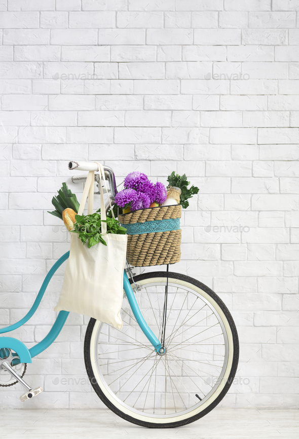 Retro bike with wildflowers and organic vegetables - Stock Photo - Images