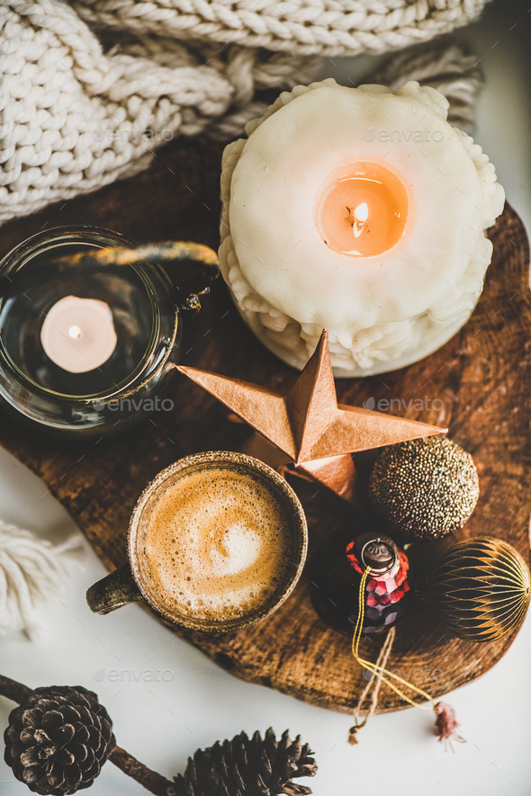 Flat-lay of Christmas composition with coffee, candles and decorative toys - Stock Photo - Images