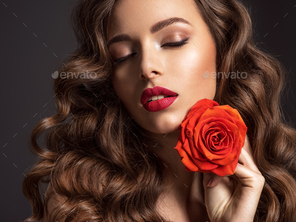 Beautiful woman with brown hair. - Stock Photo - Images