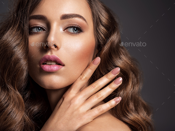 Beautiful woman with natural color of nails. - Stock Photo - Images