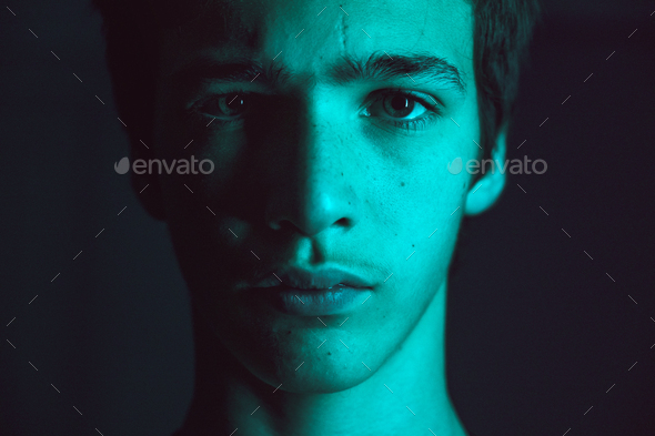 Portrait of a young man. Portrait of a handsome man, looking in the camera. - Stock Photo - Images