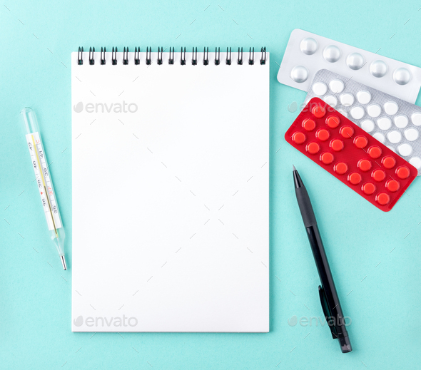 open notebook with blank white clean page to write the treatment plan of the disease.