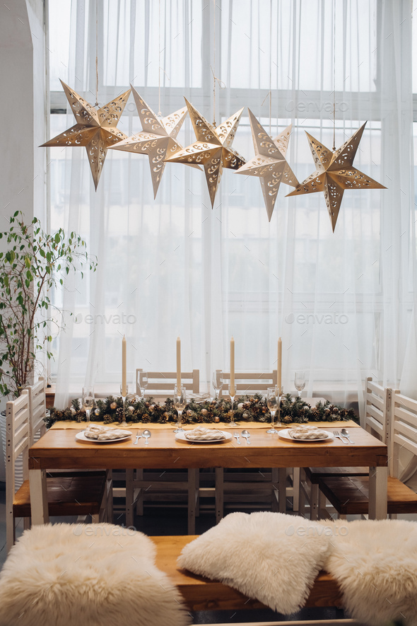 Dining table with decorative fir branches. Christmas holidays - Stock Photo - Images