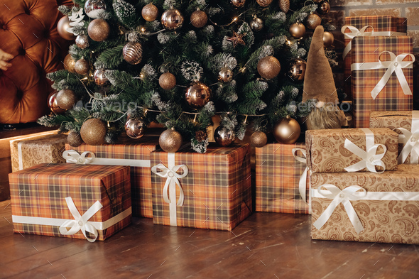 Wrapped Christmas presents under the tree. Christmas tree - Stock Photo - Images